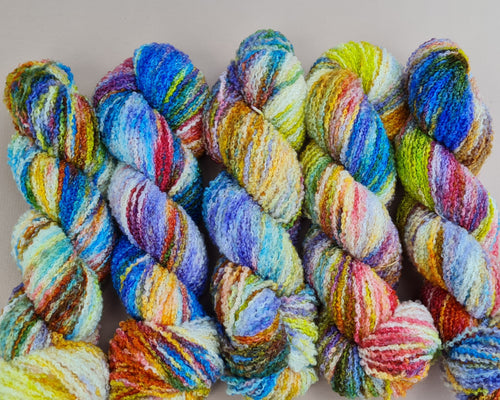 A petals rainbow,  Dk  Boucle 100g 220m.