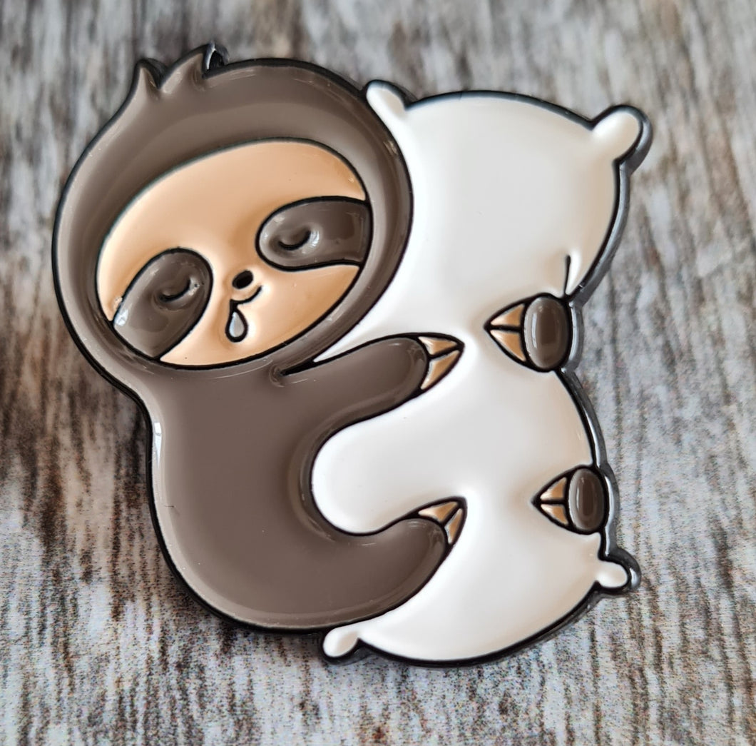 Pin badge, sloth & pillow