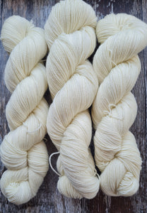 Natural undyed, superwashed merino  nylon silver sparkle.75/20/5 100g 4ply.